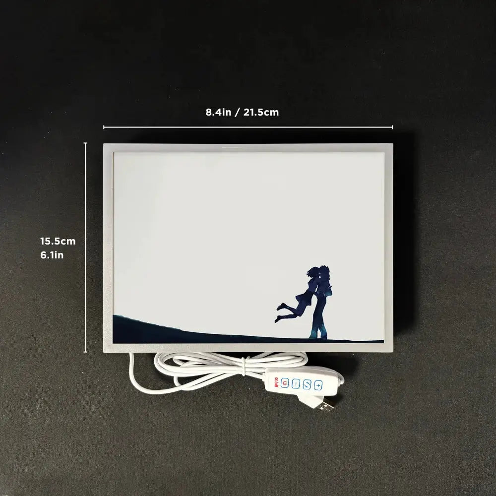 White rectangular led night light panel featuring dark blue anime silhouette of two figures embracing for wall art decor