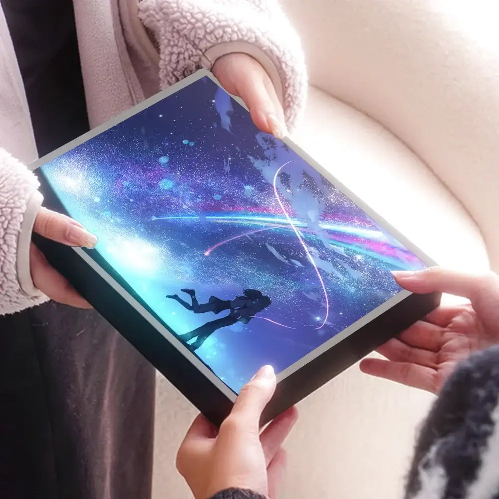 Your name taki tachibana led night light wall art features a black-framed digital display with a glowing cosmic diver scene
