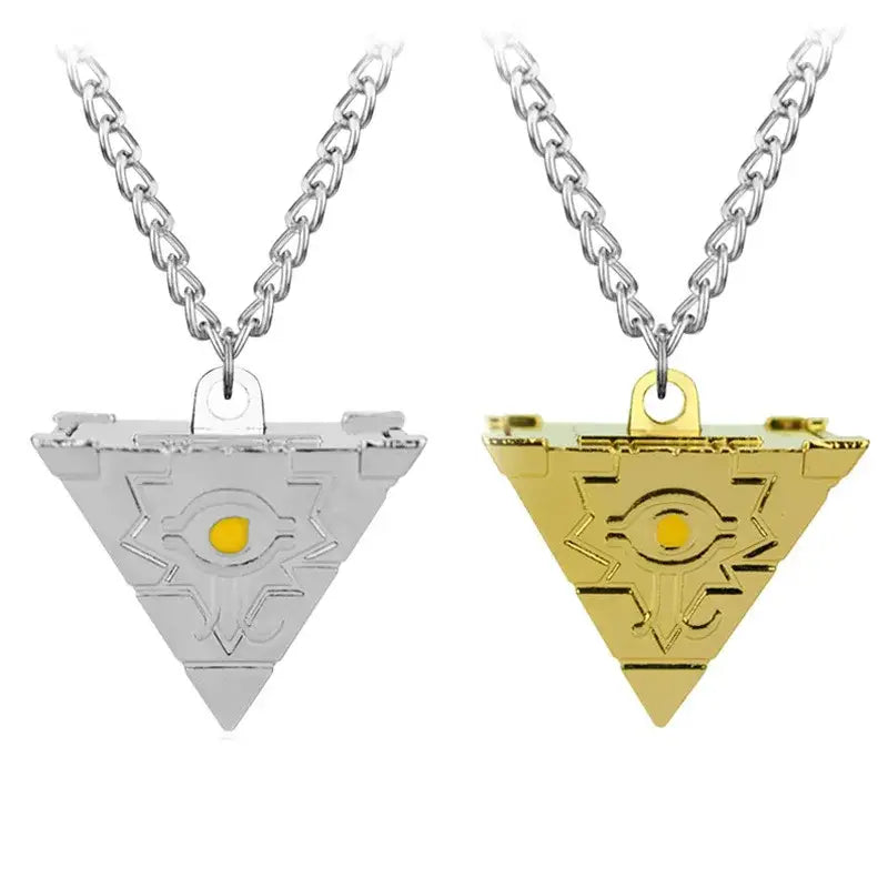 Silver and gold alloy pendant necklace with triangular shape and central eye emblem featuring geometric patterns