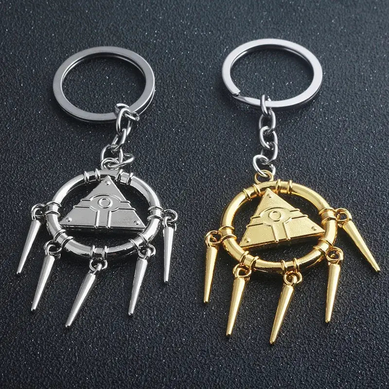 Silver and gold alloy pendant necklace keychains with eye motifs and spiked circular rings from yu-gi-oh yugi millennium